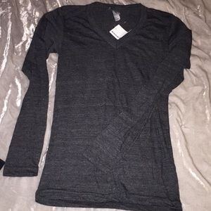 Grey long sleeve T-shirt.